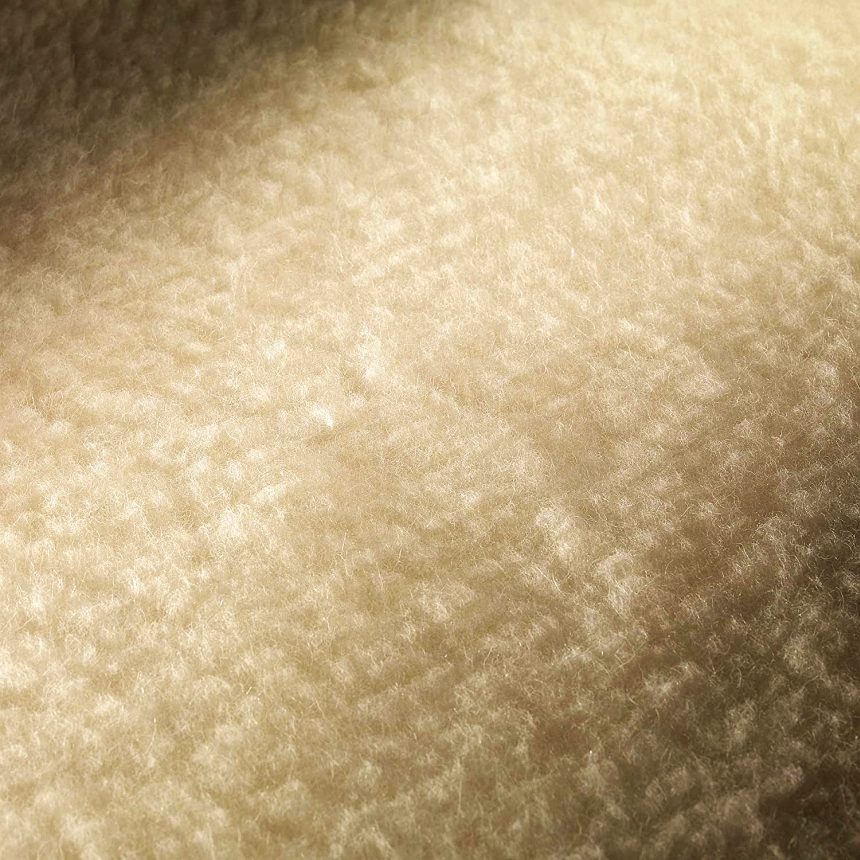 Primo piano del sofficissimo e accogliente tessuto 100% lana e merino dello Scaldasonno Imetec Adapto Maxi
